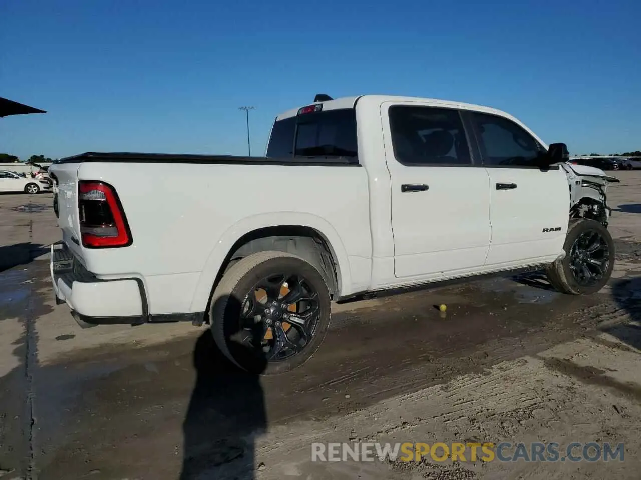 3 Photograph of a damaged car 1C6SRFHT7PN671931 RAM 1500 2023