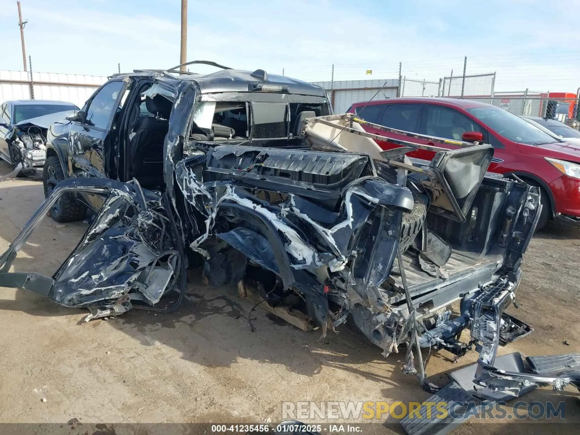 3 Photograph of a damaged car 1C6SRFHT8PN634838 RAM 1500 2023