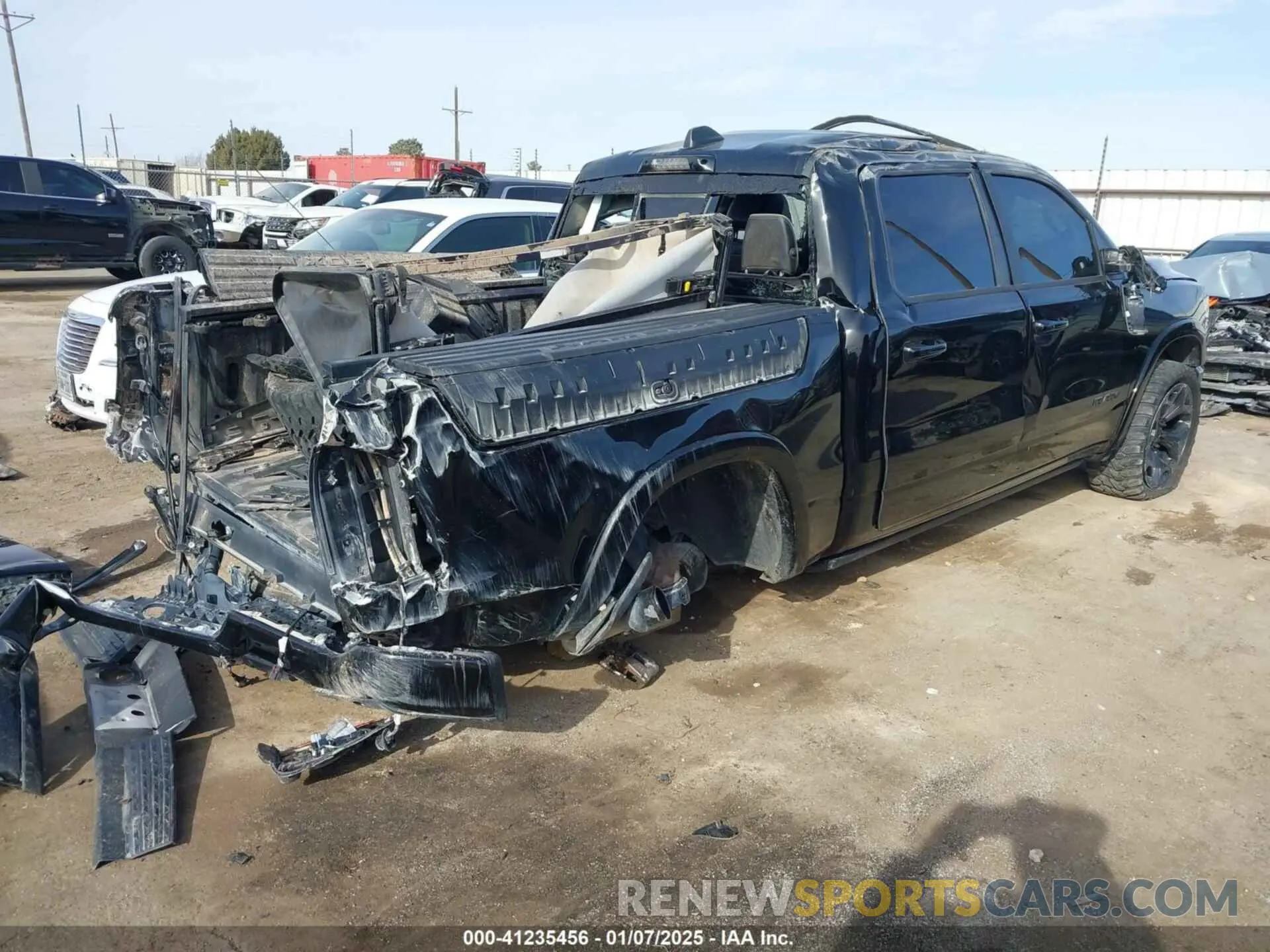 4 Photograph of a damaged car 1C6SRFHT8PN634838 RAM 1500 2023