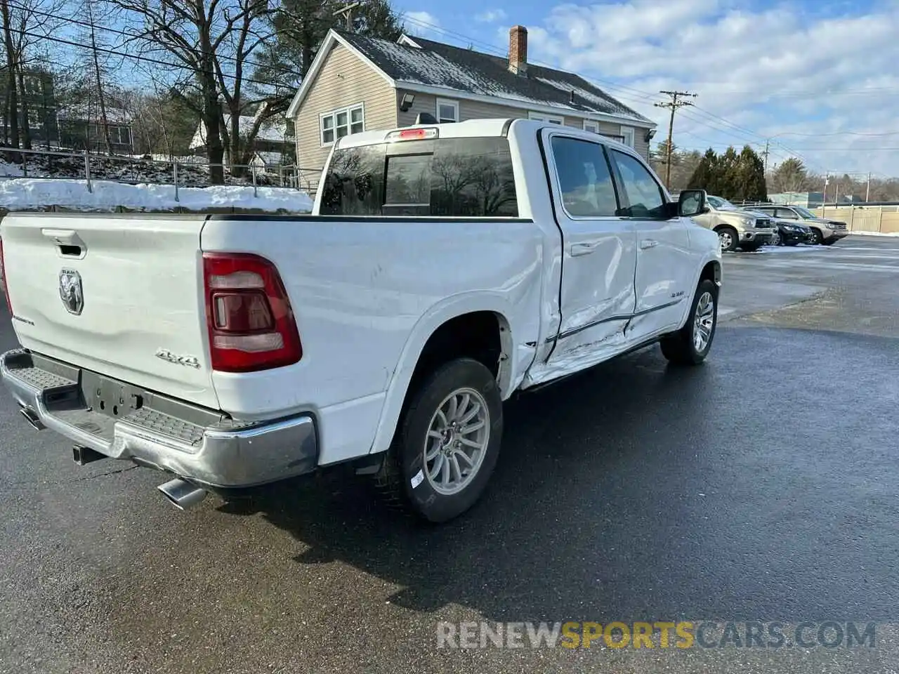 3 Photograph of a damaged car 1C6SRFHT9PN540046 RAM 1500 2023