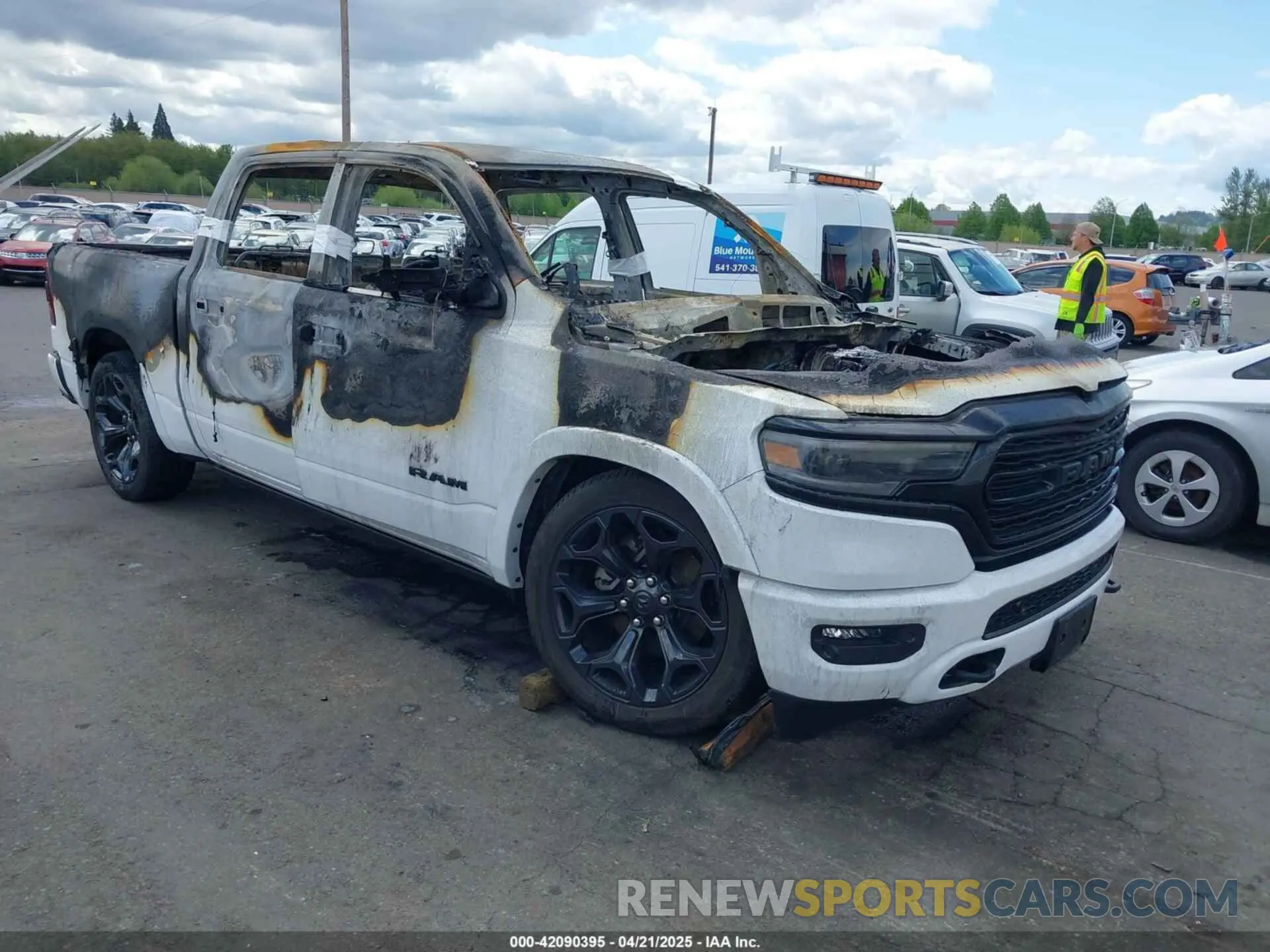 1 Photograph of a damaged car 1C6SRFHT9PN602190 RAM 1500 2023