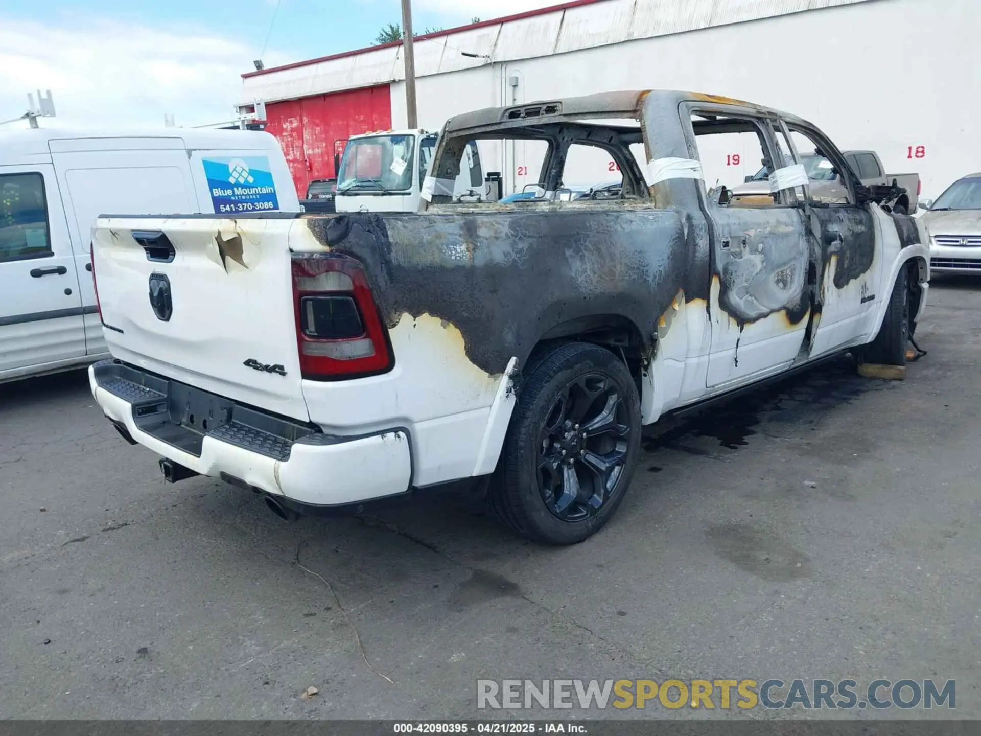 4 Photograph of a damaged car 1C6SRFHT9PN602190 RAM 1500 2023