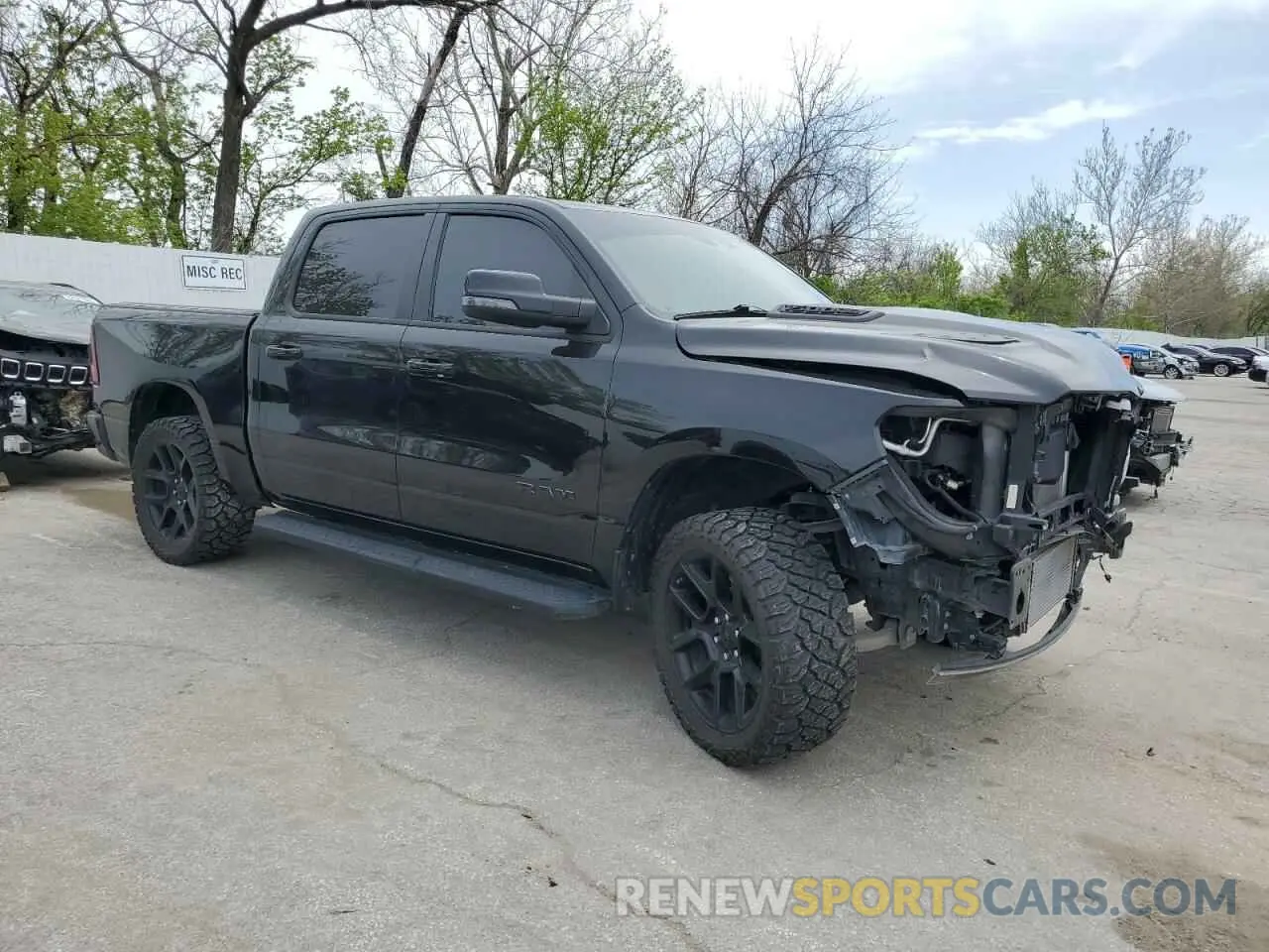 4 Photograph of a damaged car 1C6SRFJM0PN550564 RAM 1500 2023