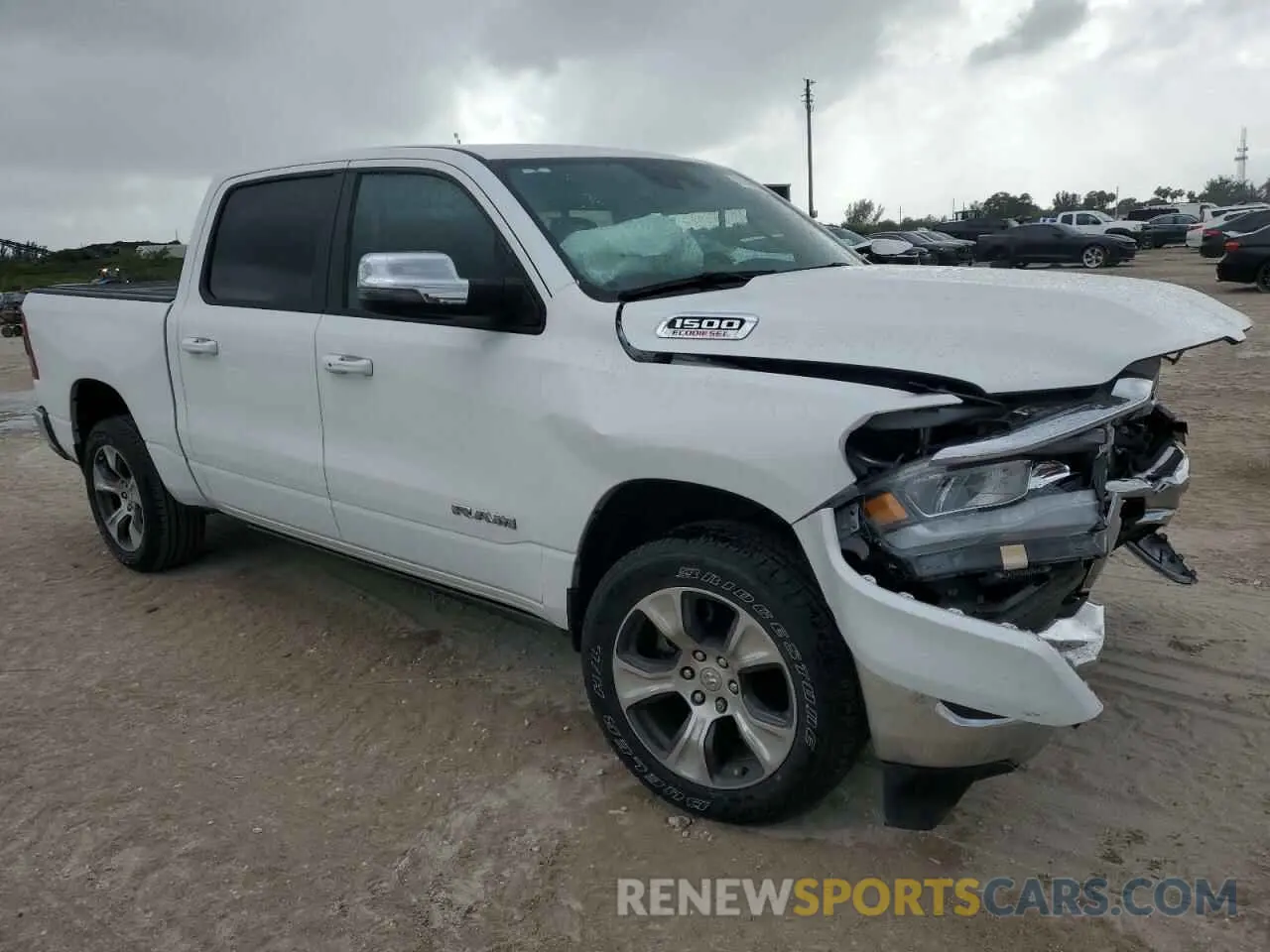 4 Photograph of a damaged car 1C6SRFJM8PN515125 RAM 1500 2023