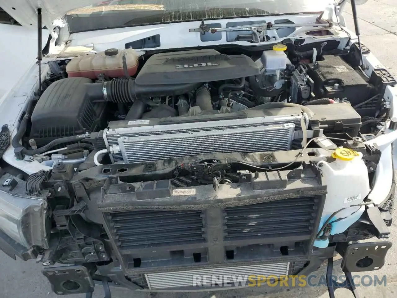 11 Photograph of a damaged car 1C6SRFJM9PN556833 RAM 1500 2023