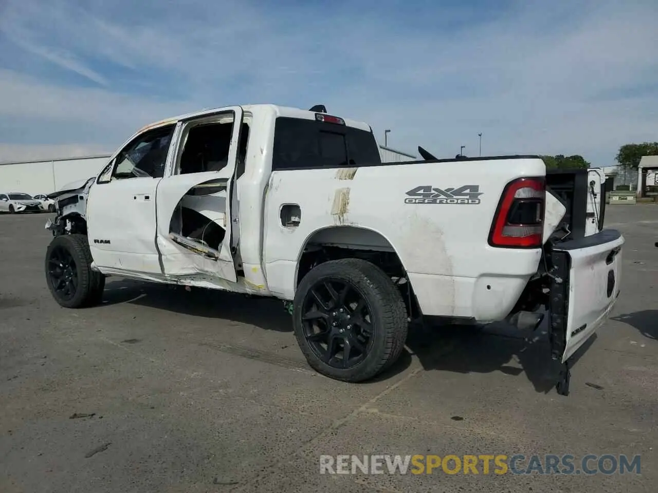 2 Photograph of a damaged car 1C6SRFJM9PN556833 RAM 1500 2023