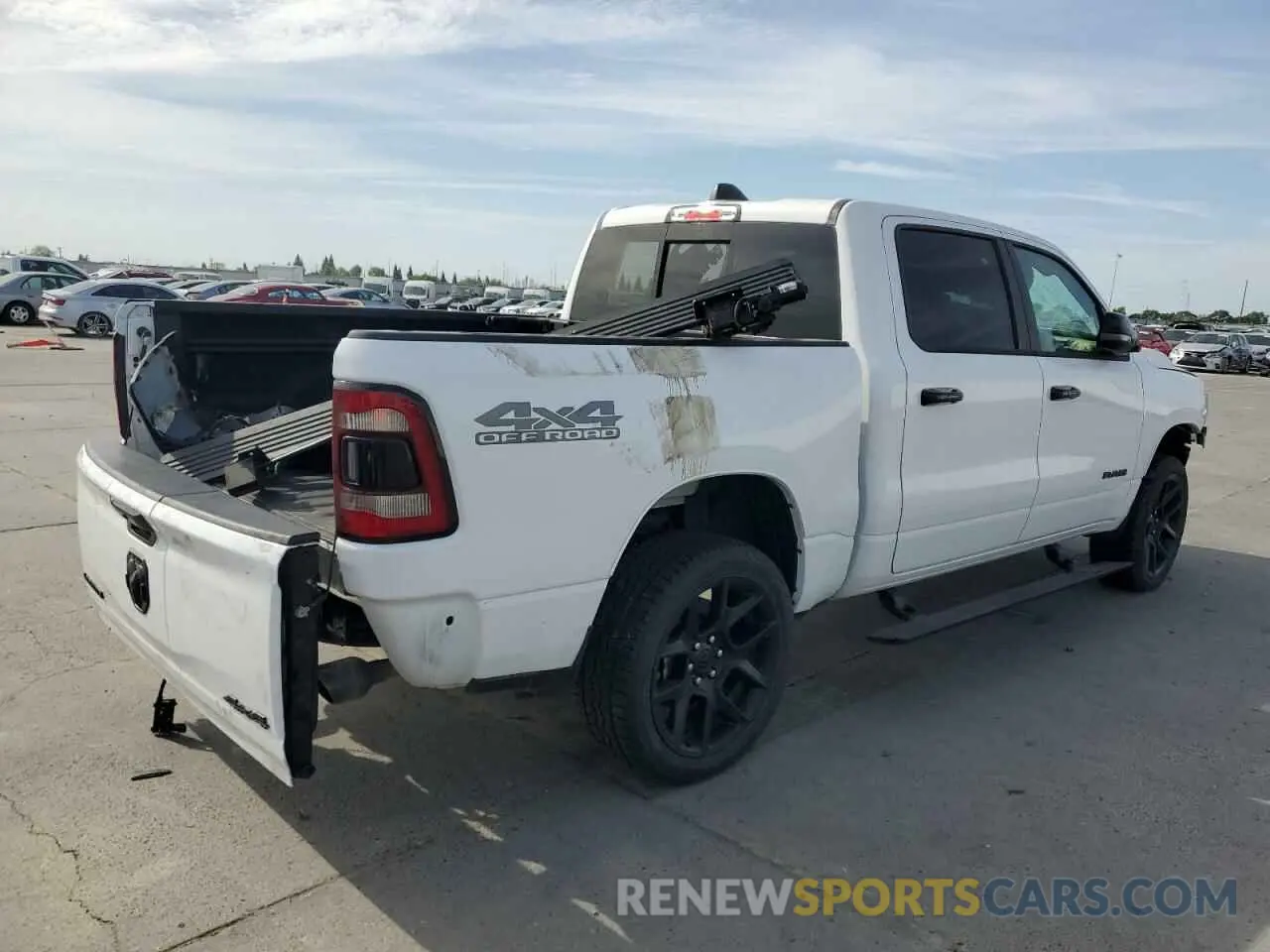 3 Photograph of a damaged car 1C6SRFJM9PN556833 RAM 1500 2023