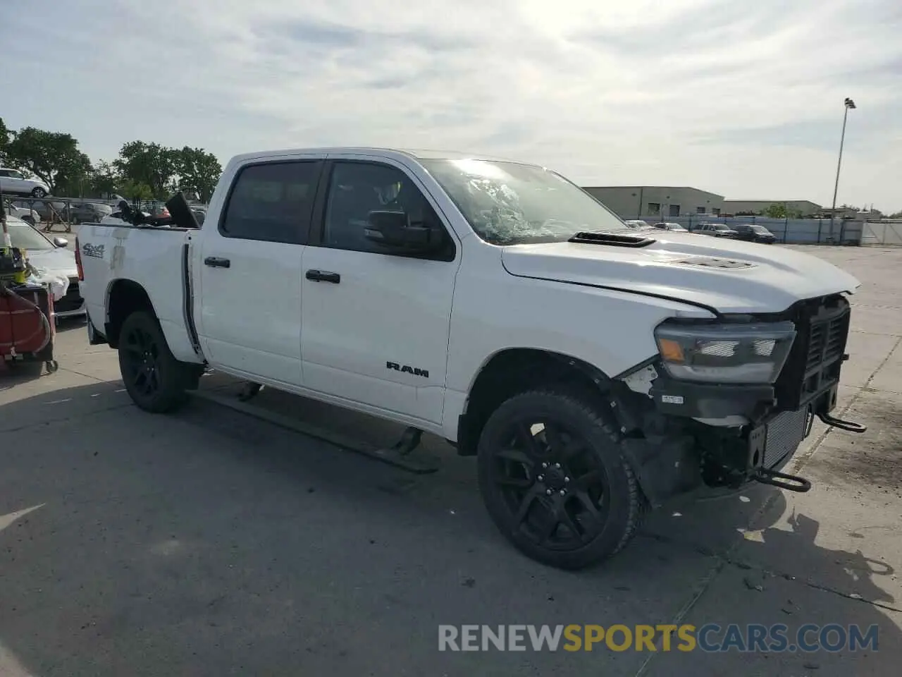 4 Photograph of a damaged car 1C6SRFJM9PN556833 RAM 1500 2023