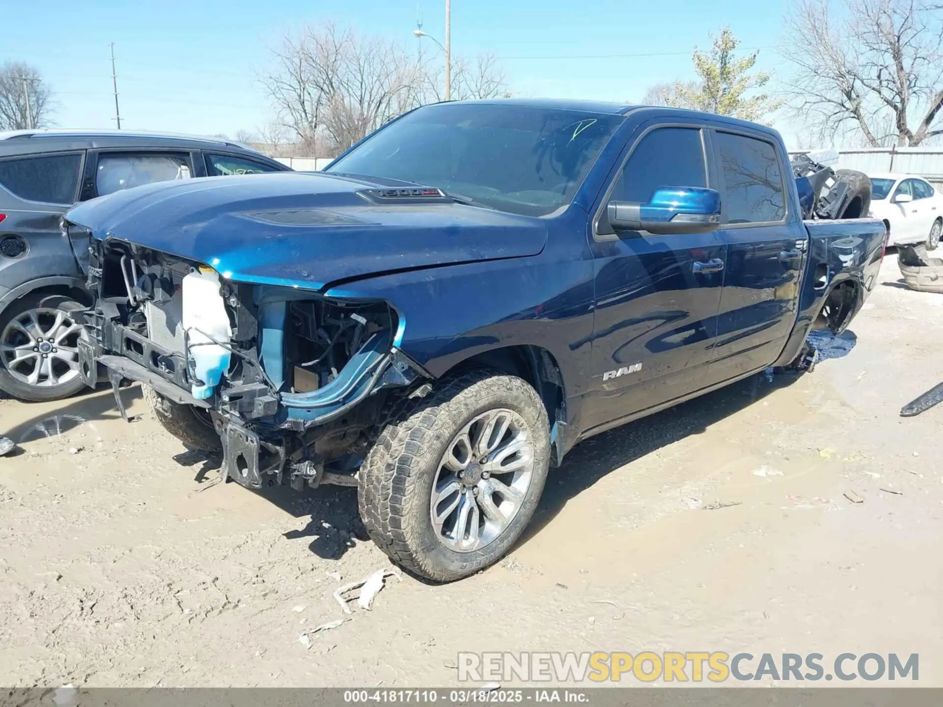 2 Photograph of a damaged car 1C6SRFJMXPN549423 RAM 1500 2023