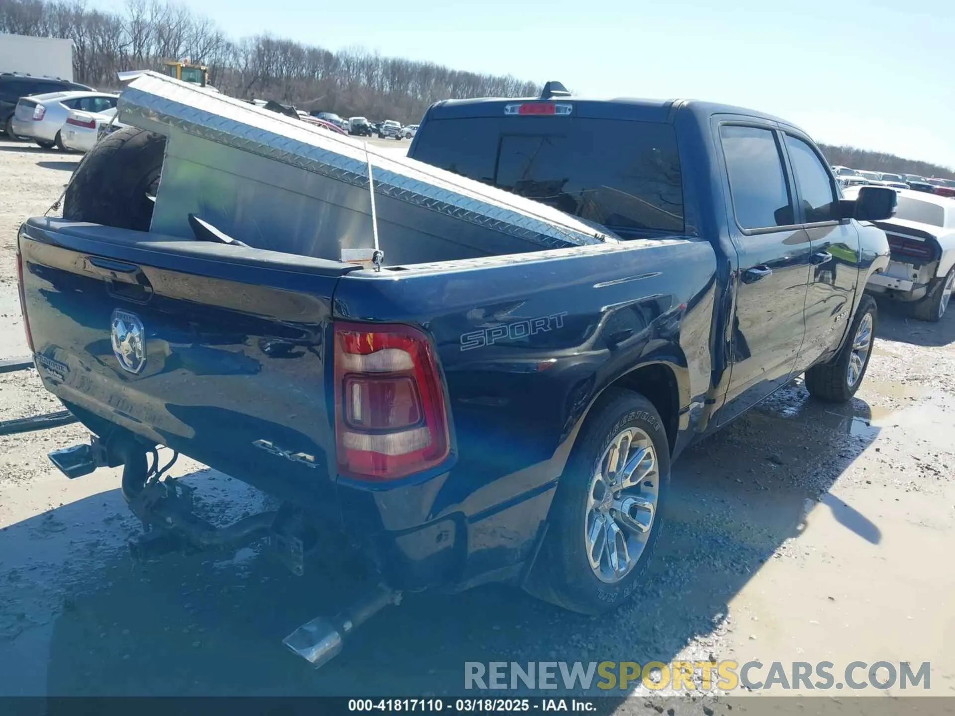 4 Photograph of a damaged car 1C6SRFJMXPN549423 RAM 1500 2023