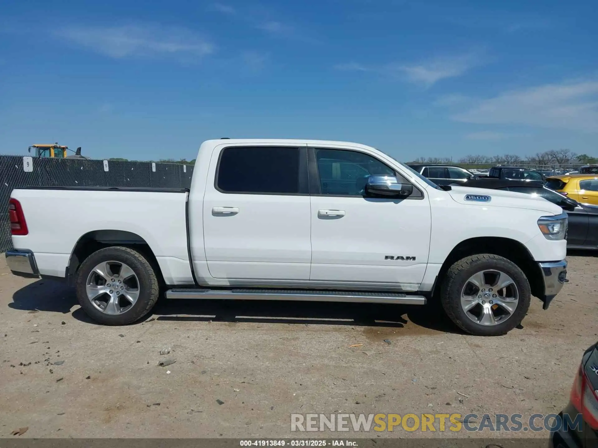 13 Photograph of a damaged car 1C6SRFJT0PN508550 RAM 1500 2023