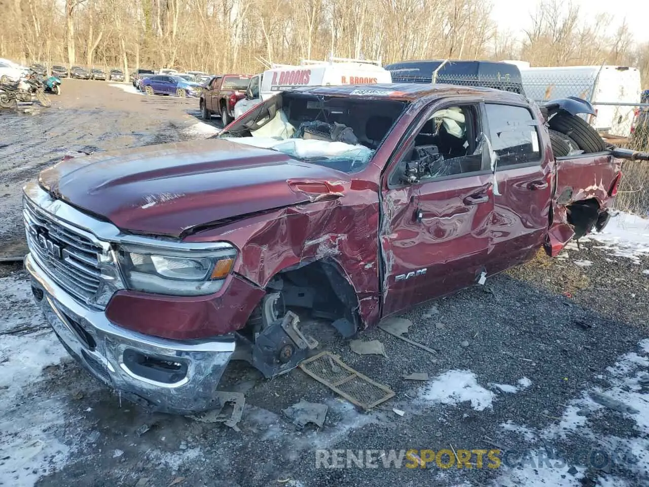 1 Photograph of a damaged car 1C6SRFJT0PN542519 RAM 1500 2023