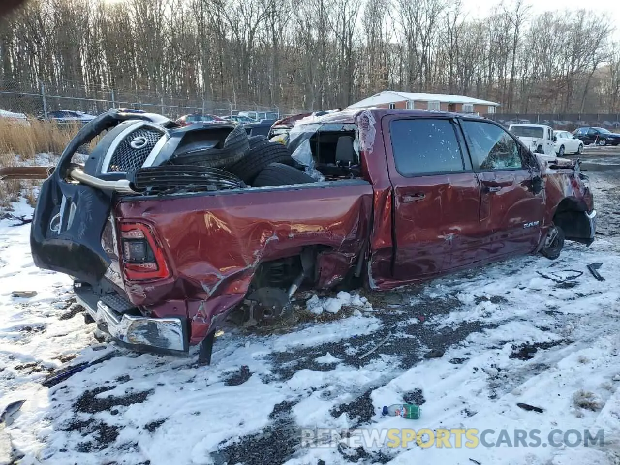 3 Photograph of a damaged car 1C6SRFJT0PN542519 RAM 1500 2023