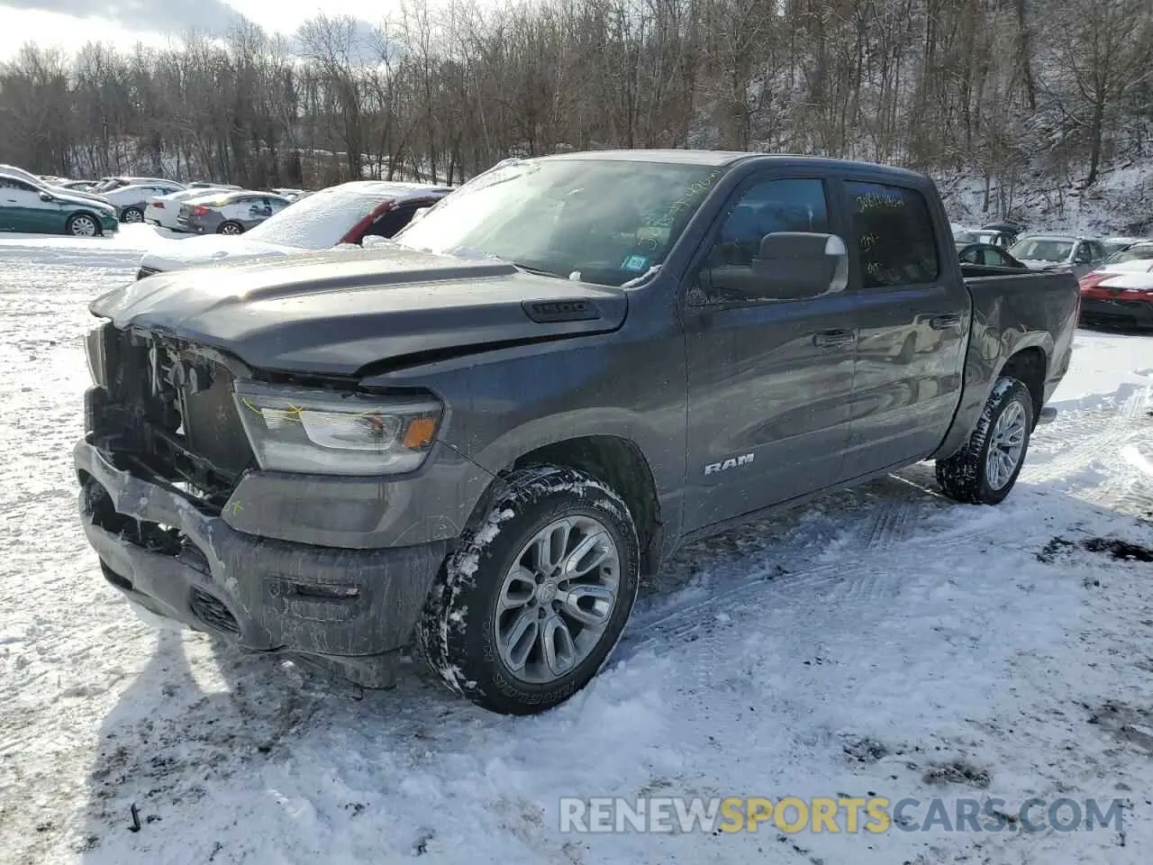 1 Photograph of a damaged car 1C6SRFJT1PN599229 RAM 1500 2023