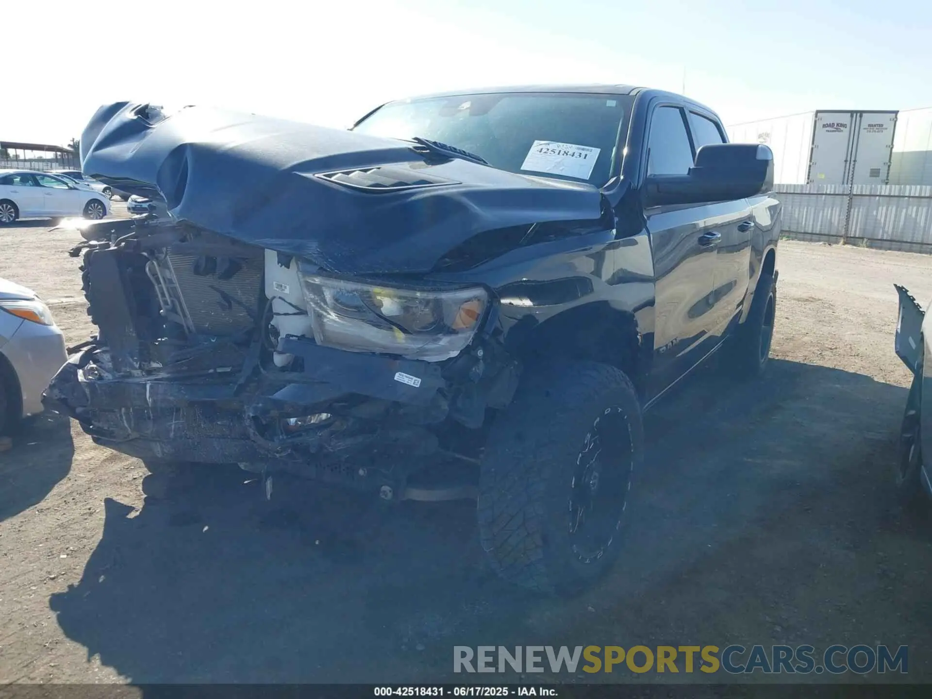 2 Photograph of a damaged car 1C6SRFJT2PN547835 RAM 1500 2023