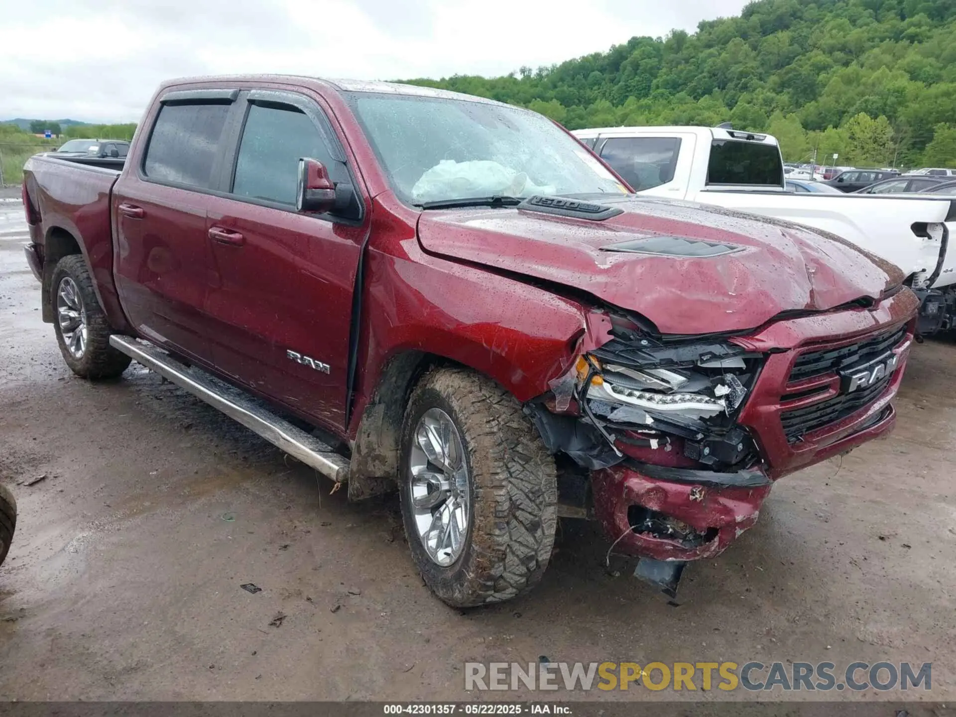 1 Photograph of a damaged car 1C6SRFJT2PN588238 RAM 1500 2023