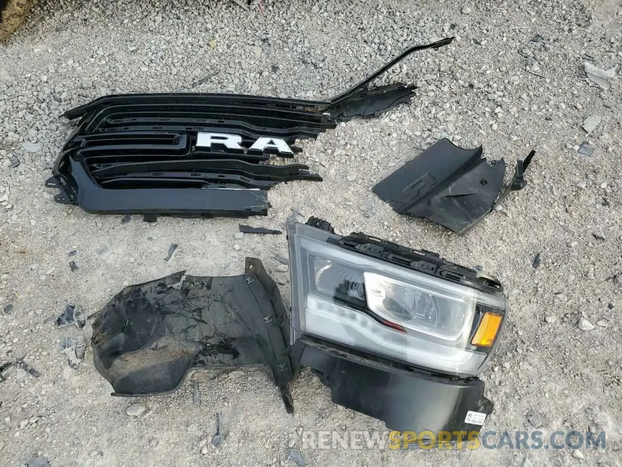 12 Photograph of a damaged car 1C6SRFJT3PN517002 RAM 1500 2023