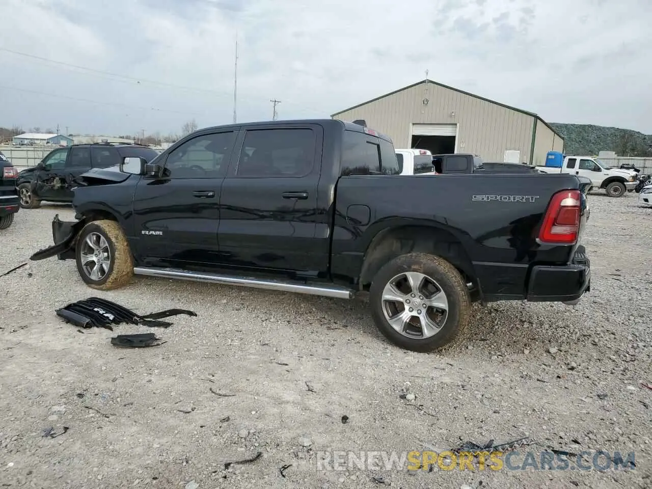 2 Photograph of a damaged car 1C6SRFJT3PN517002 RAM 1500 2023
