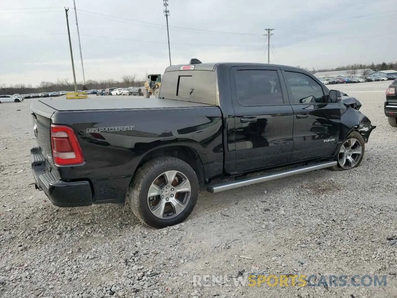3 Photograph of a damaged car 1C6SRFJT3PN517002 RAM 1500 2023
