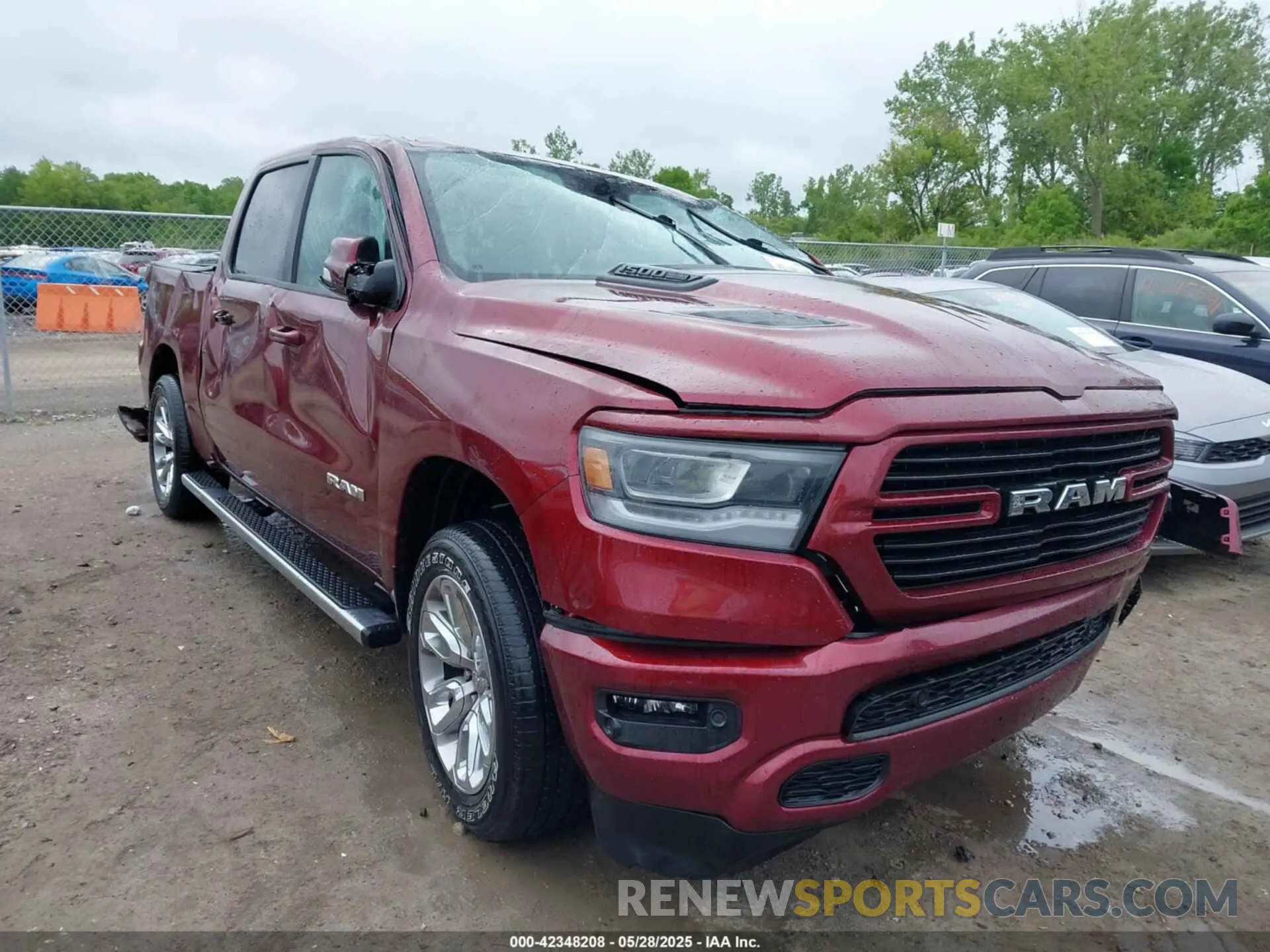 1 Photograph of a damaged car 1C6SRFJT3PN522152 RAM 1500 2023
