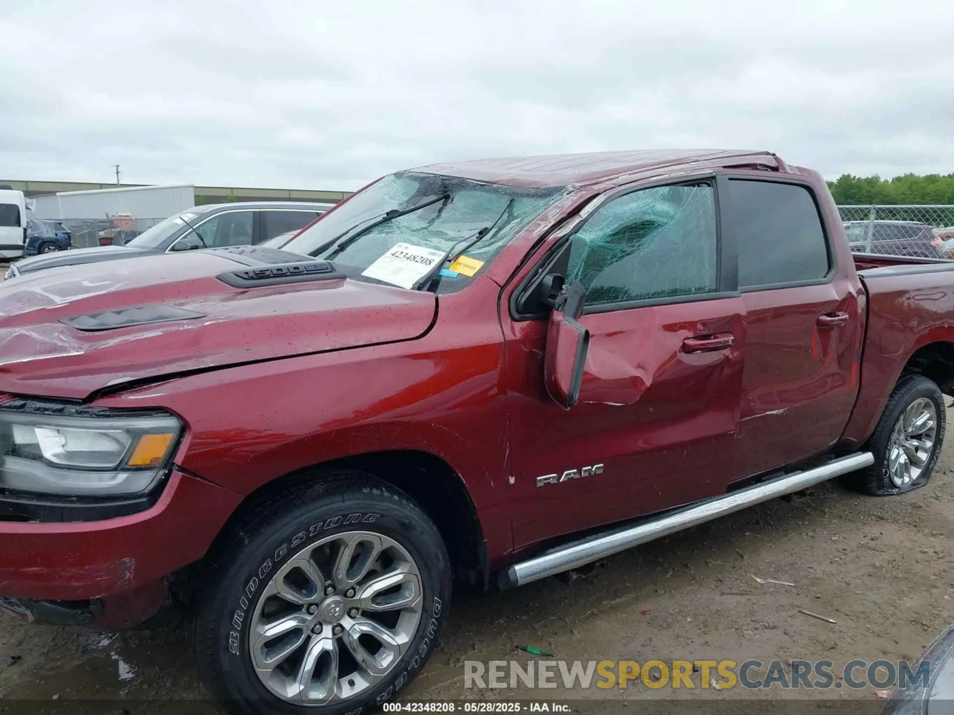 12 Photograph of a damaged car 1C6SRFJT3PN522152 RAM 1500 2023