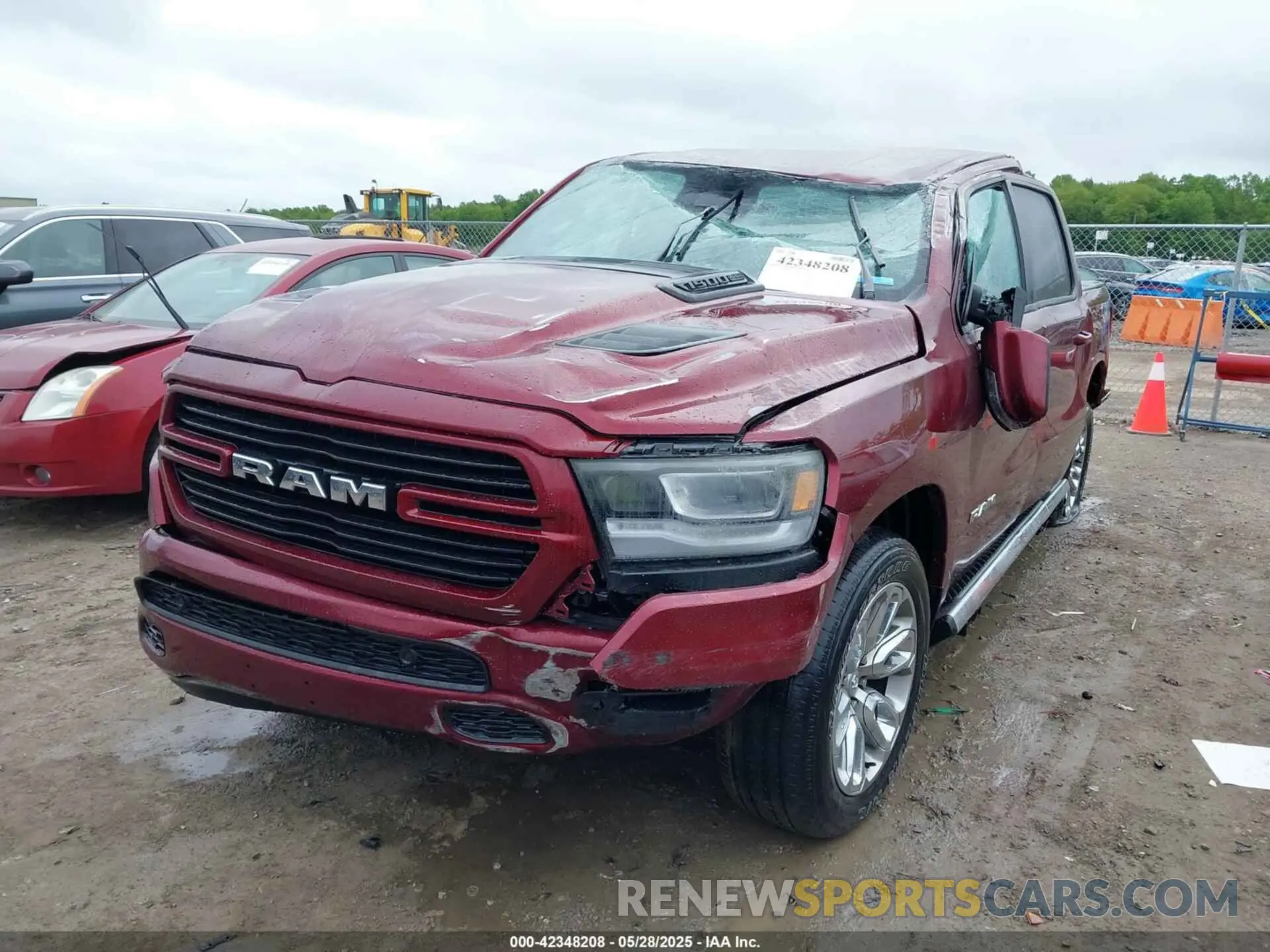 2 Photograph of a damaged car 1C6SRFJT3PN522152 RAM 1500 2023