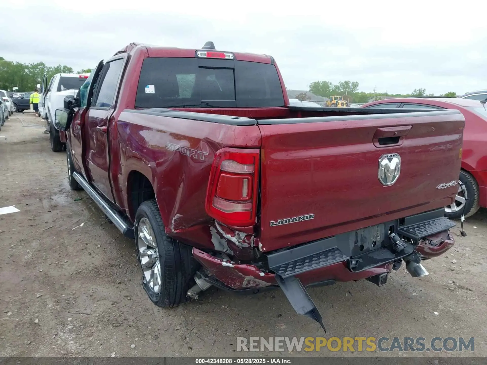 3 Photograph of a damaged car 1C6SRFJT3PN522152 RAM 1500 2023