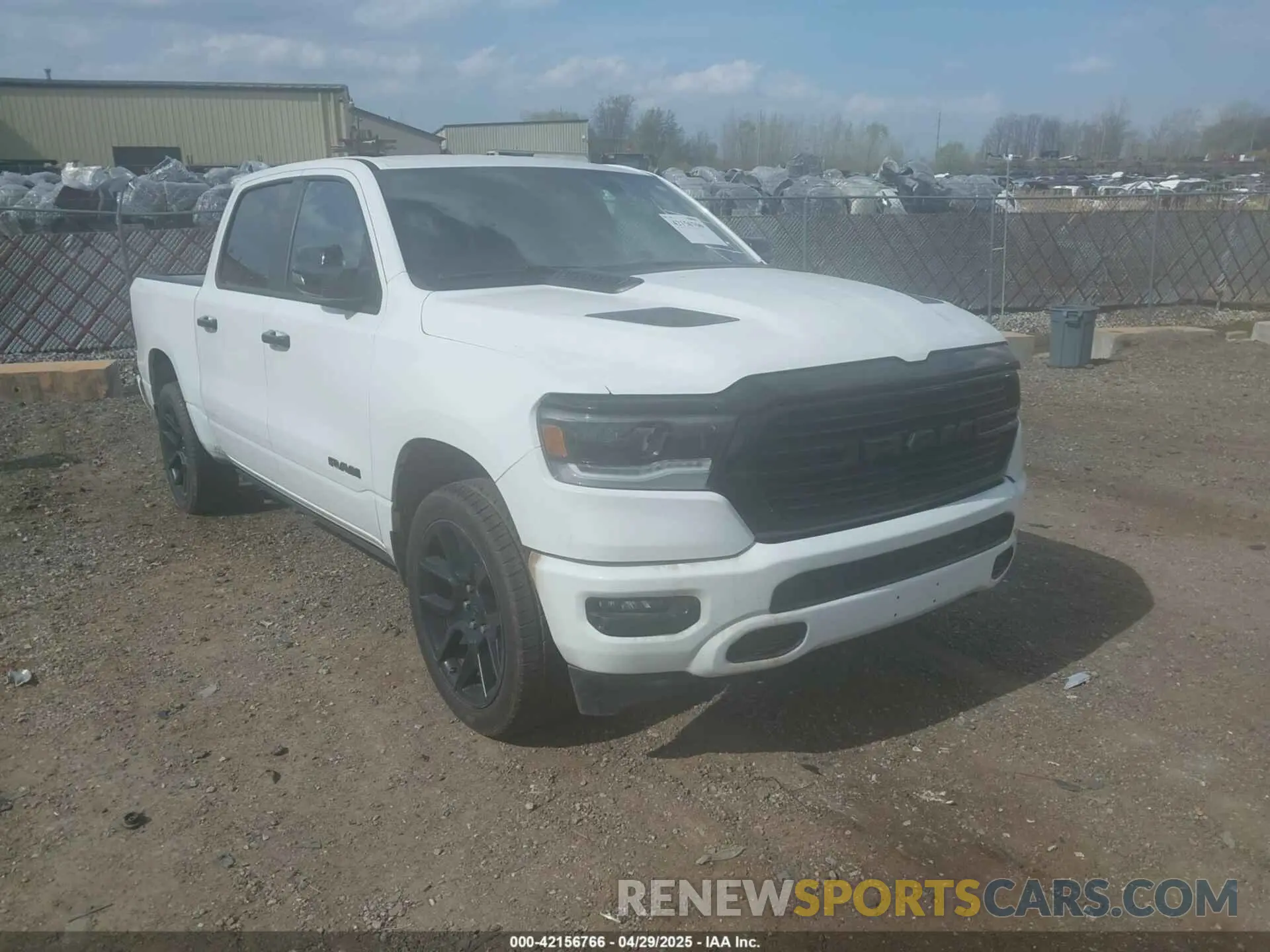 1 Photograph of a damaged car 1C6SRFJT3PN541901 RAM 1500 2023