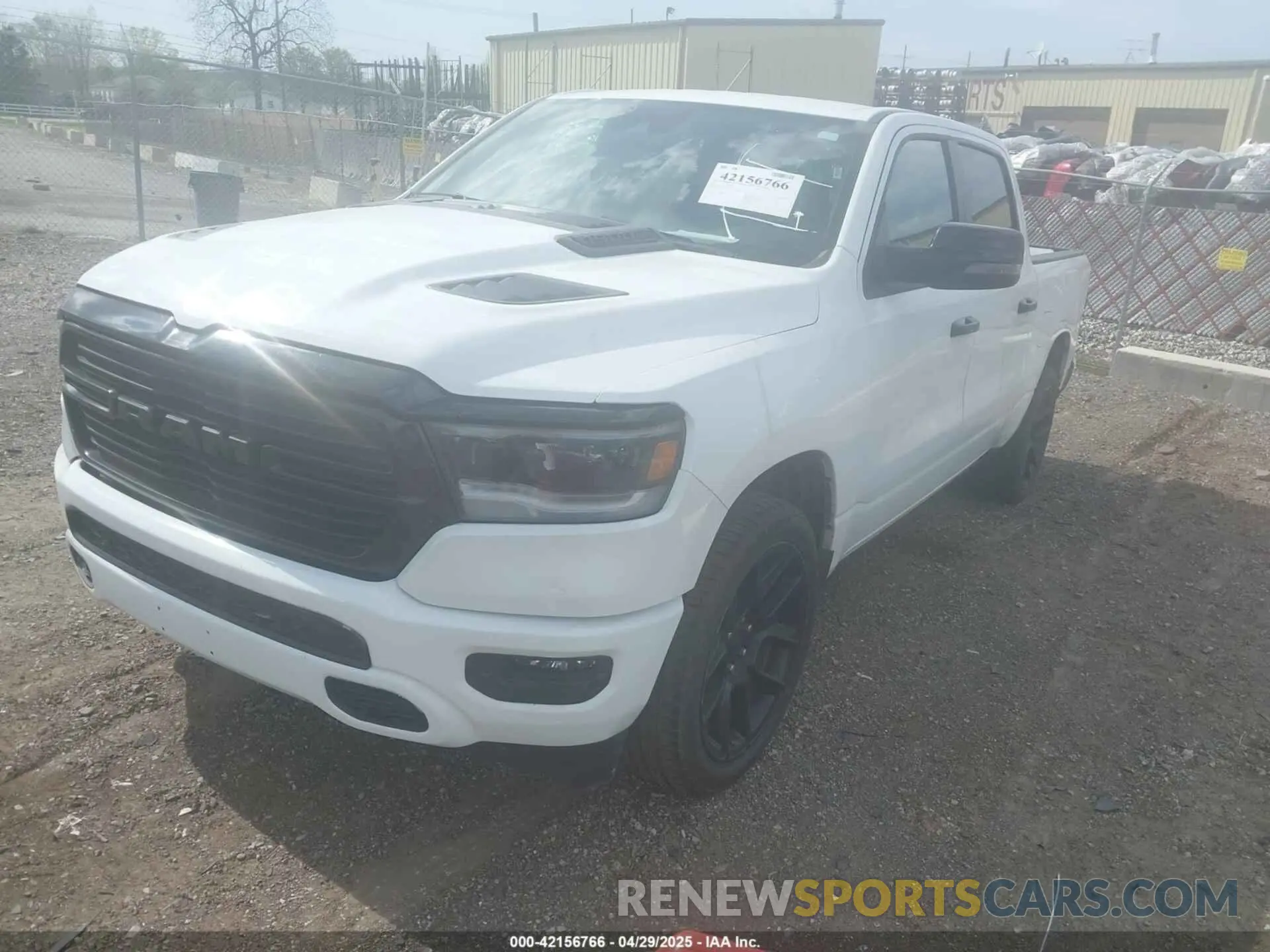 2 Photograph of a damaged car 1C6SRFJT3PN541901 RAM 1500 2023