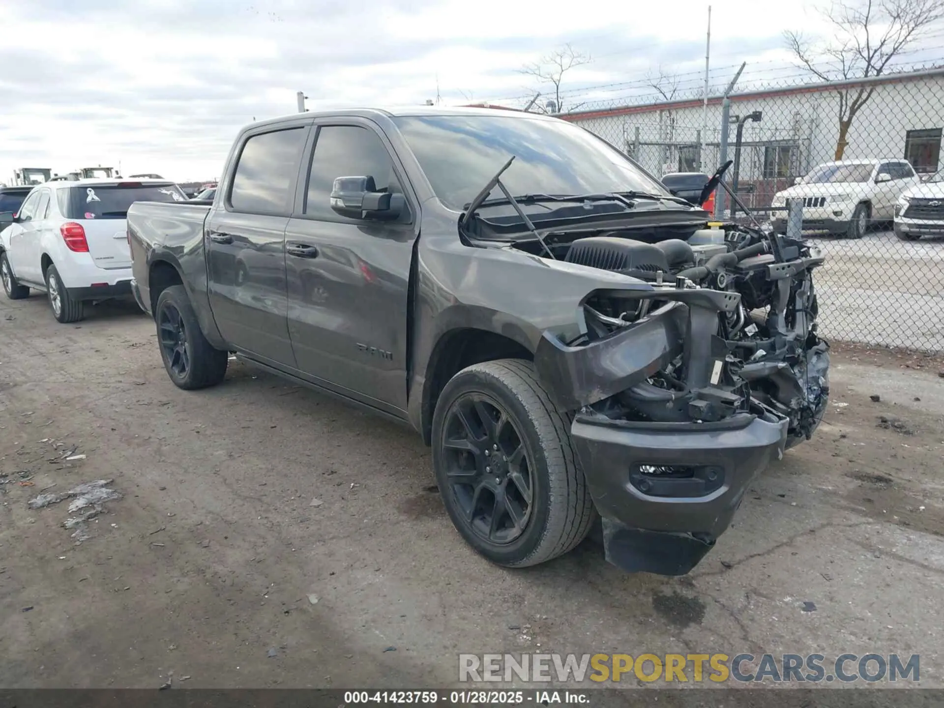 1 Photograph of a damaged car 1C6SRFJT3PN573439 RAM 1500 2023