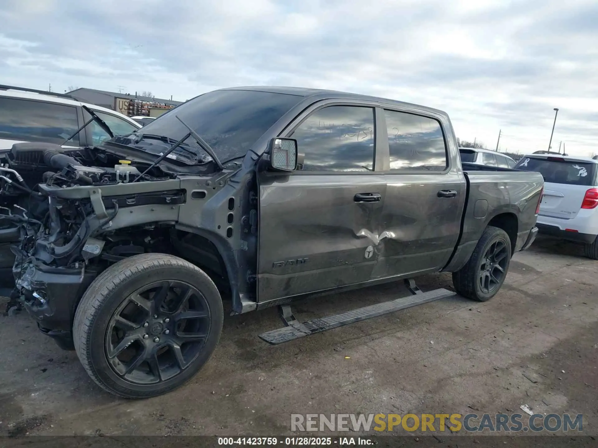 14 Photograph of a damaged car 1C6SRFJT3PN573439 RAM 1500 2023