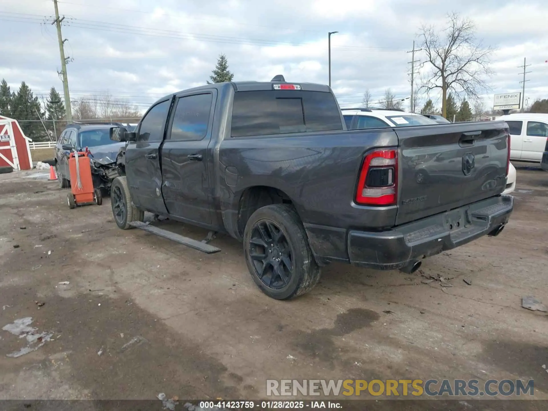 3 Photograph of a damaged car 1C6SRFJT3PN573439 RAM 1500 2023