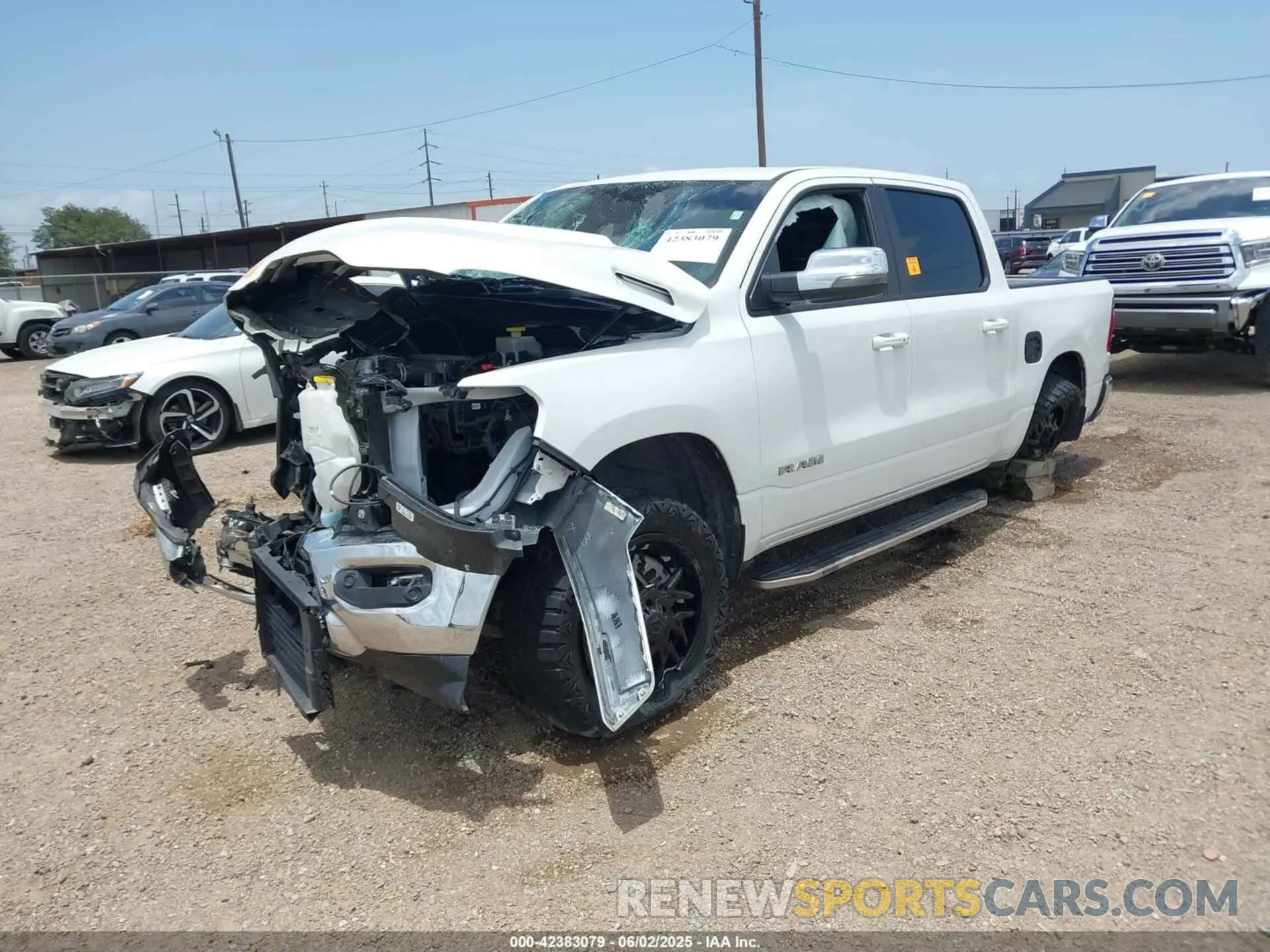 2 Photograph of a damaged car 1C6SRFJT3PN582111 RAM 1500 2023