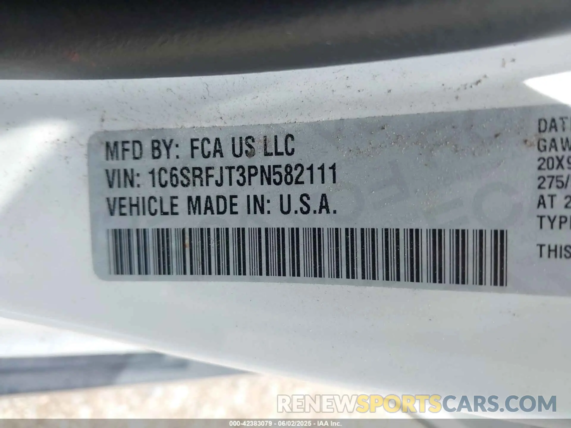 9 Photograph of a damaged car 1C6SRFJT3PN582111 RAM 1500 2023