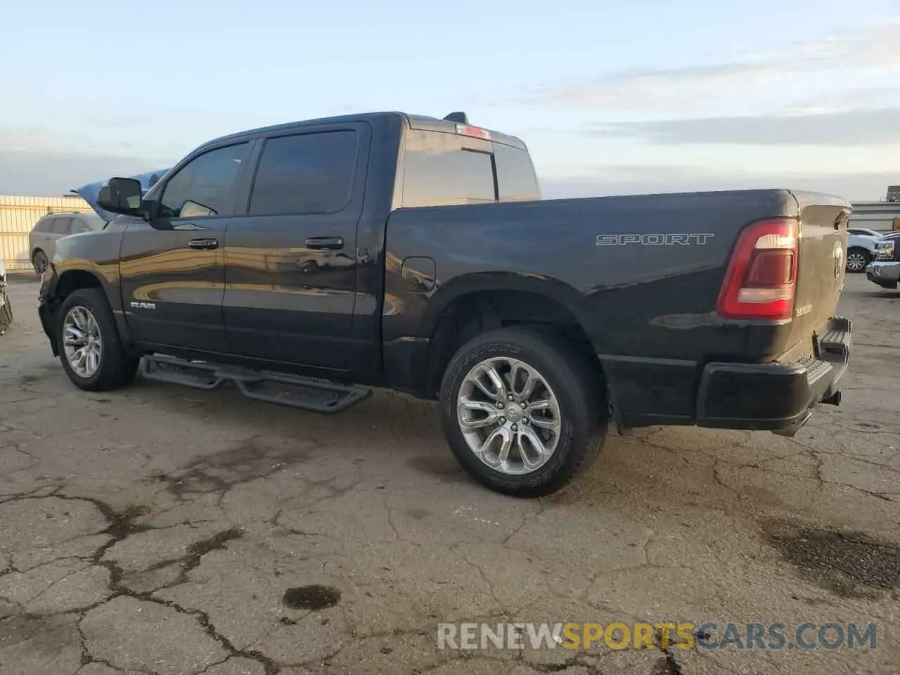 2 Photograph of a damaged car 1C6SRFJT3PN662847 RAM 1500 2023