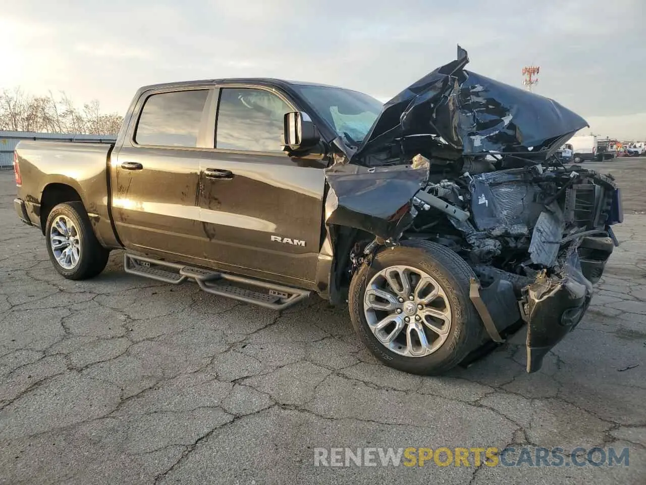 4 Photograph of a damaged car 1C6SRFJT3PN662847 RAM 1500 2023