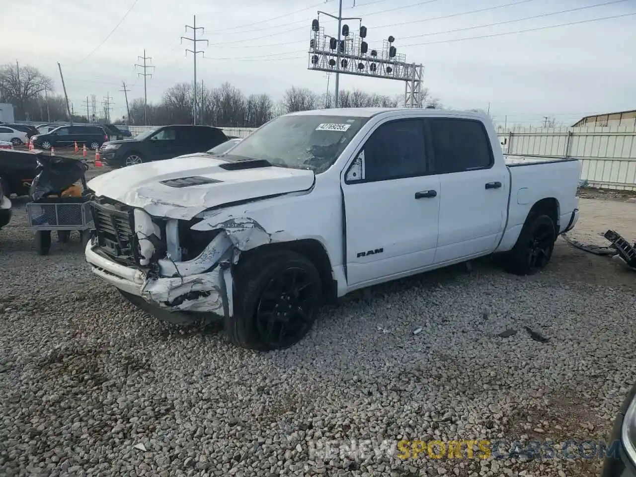 1 Photograph of a damaged car 1C6SRFJT4PN542636 RAM 1500 2023