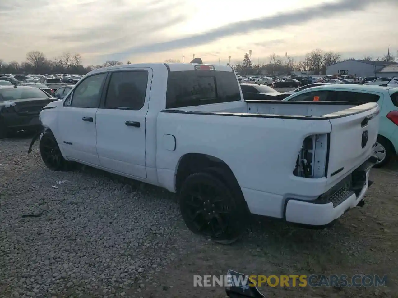 2 Photograph of a damaged car 1C6SRFJT4PN542636 RAM 1500 2023