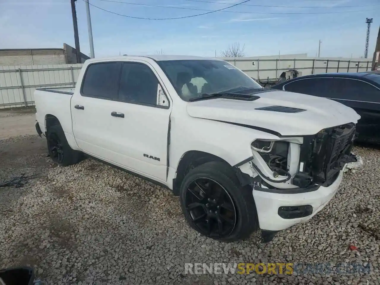 4 Photograph of a damaged car 1C6SRFJT4PN542636 RAM 1500 2023