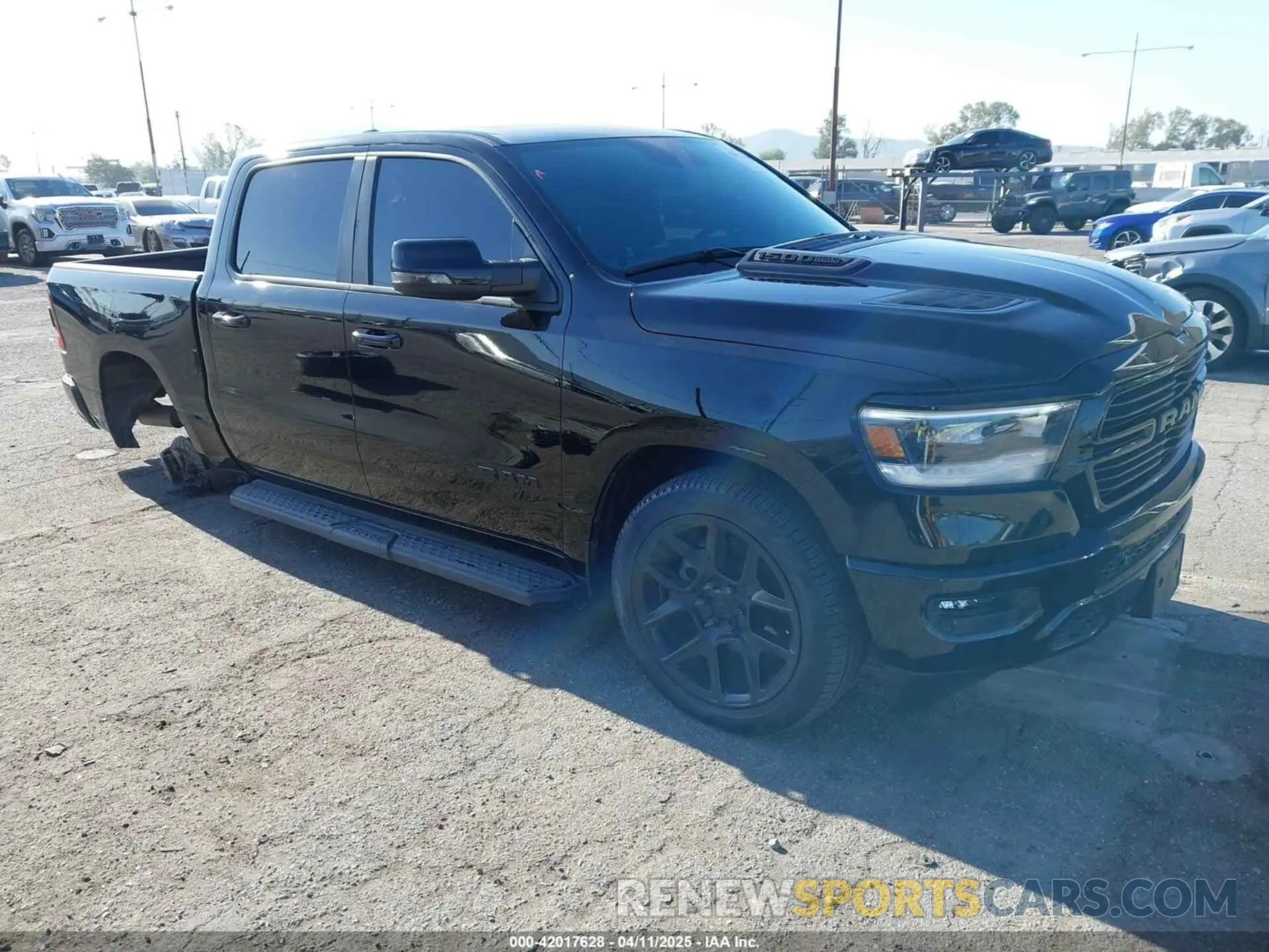 1 Photograph of a damaged car 1C6SRFJT4PN588144 RAM 1500 2023