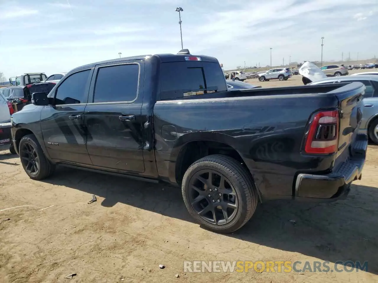 2 Photograph of a damaged car 1C6SRFJT4PN619442 RAM 1500 2023