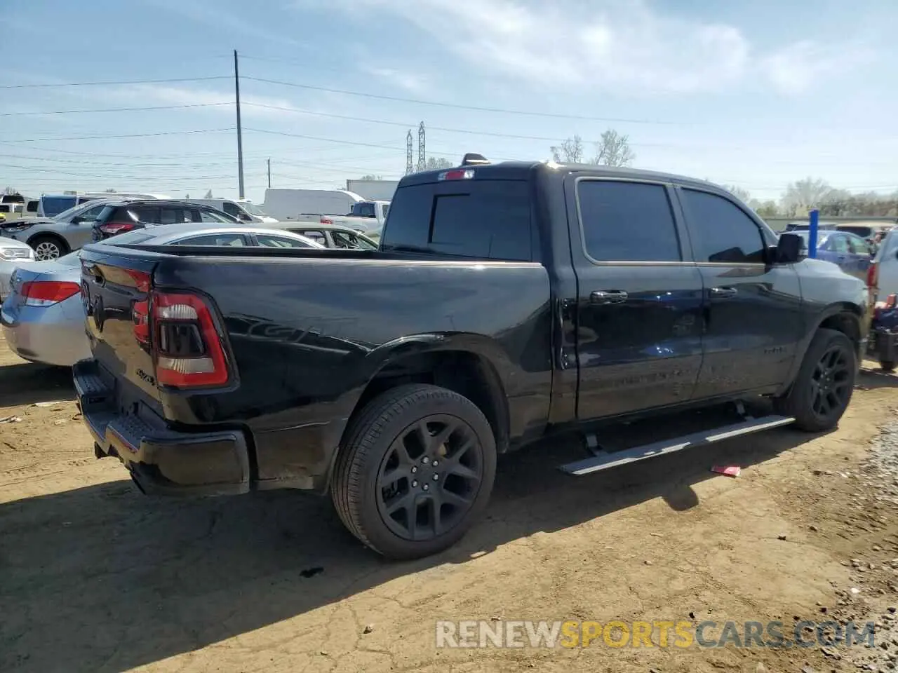 3 Photograph of a damaged car 1C6SRFJT4PN619442 RAM 1500 2023