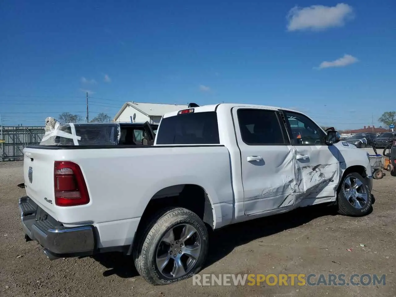 3 Photograph of a damaged car 1C6SRFJT5PN616095 RAM 1500 2023