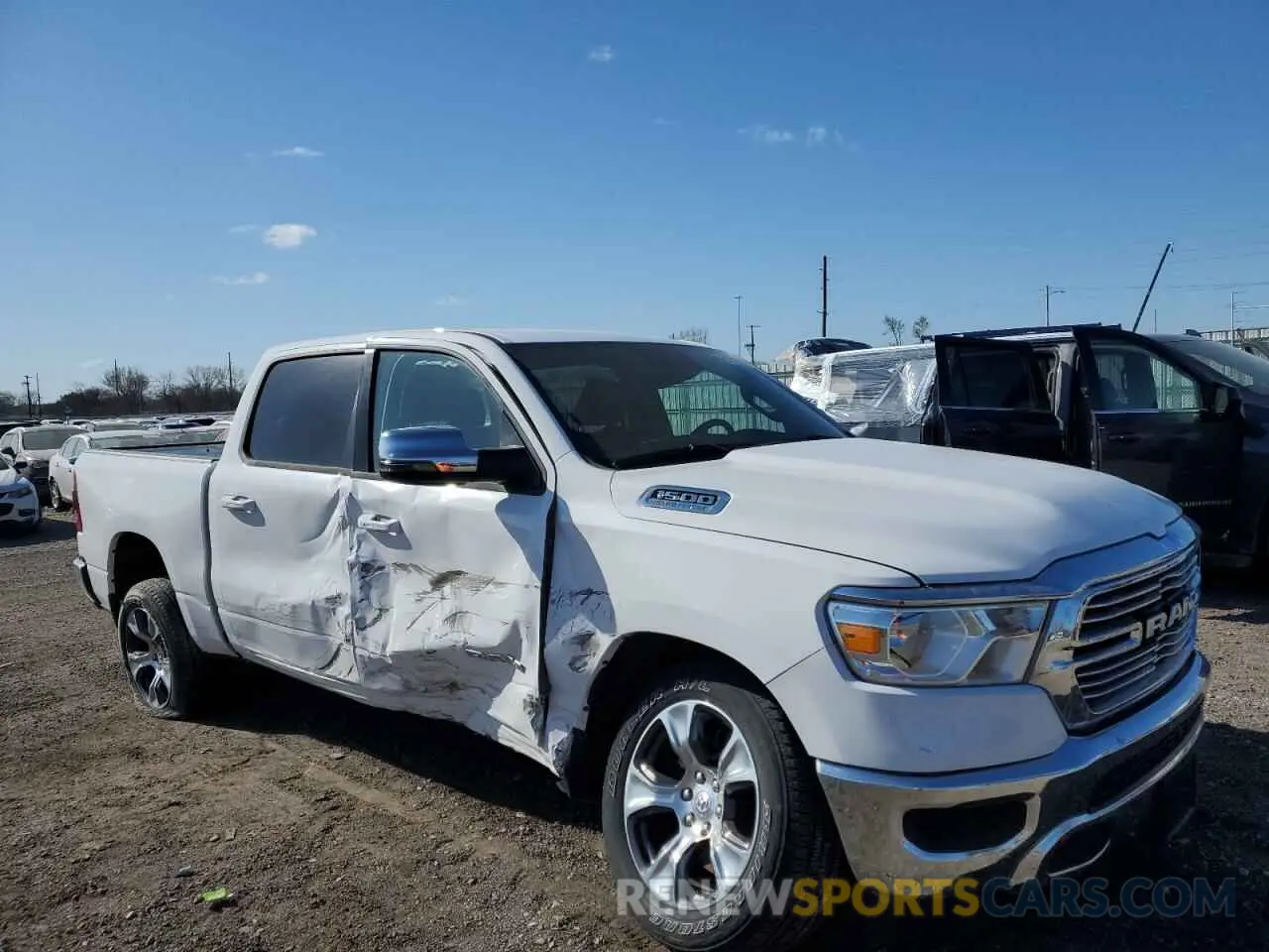 4 Photograph of a damaged car 1C6SRFJT5PN616095 RAM 1500 2023
