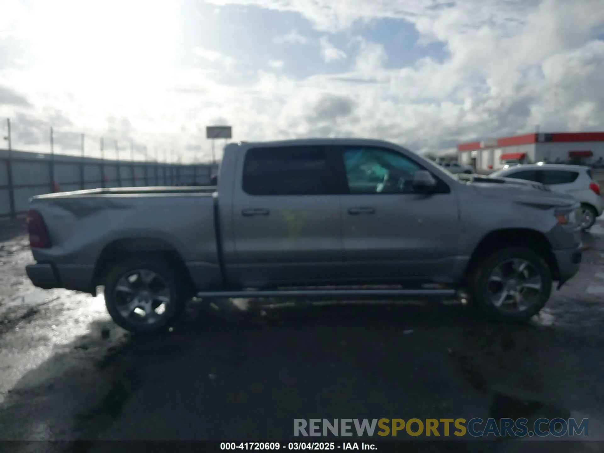 13 Photograph of a damaged car 1C6SRFJT6PN576366 RAM 1500 2023