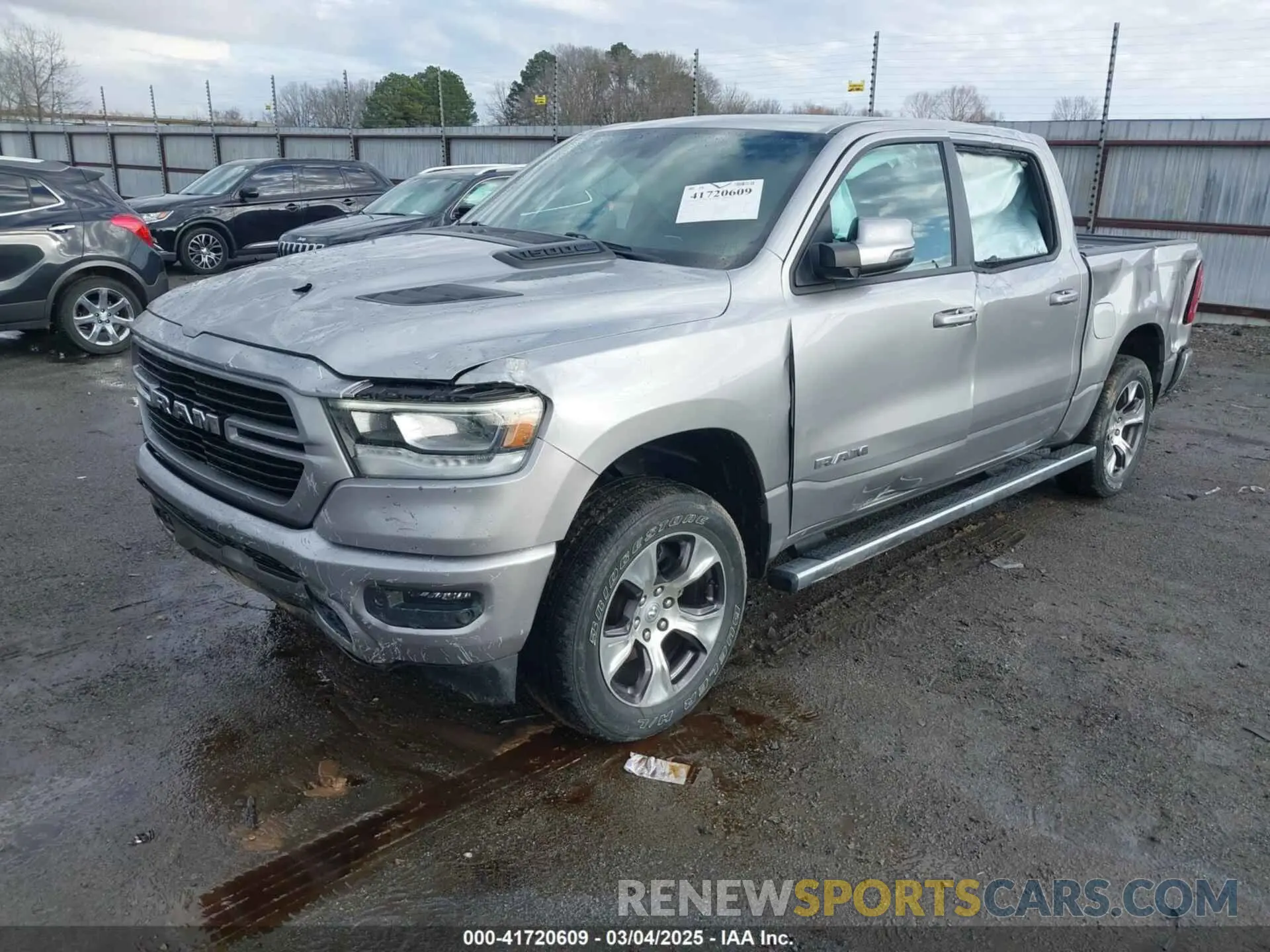 2 Photograph of a damaged car 1C6SRFJT6PN576366 RAM 1500 2023