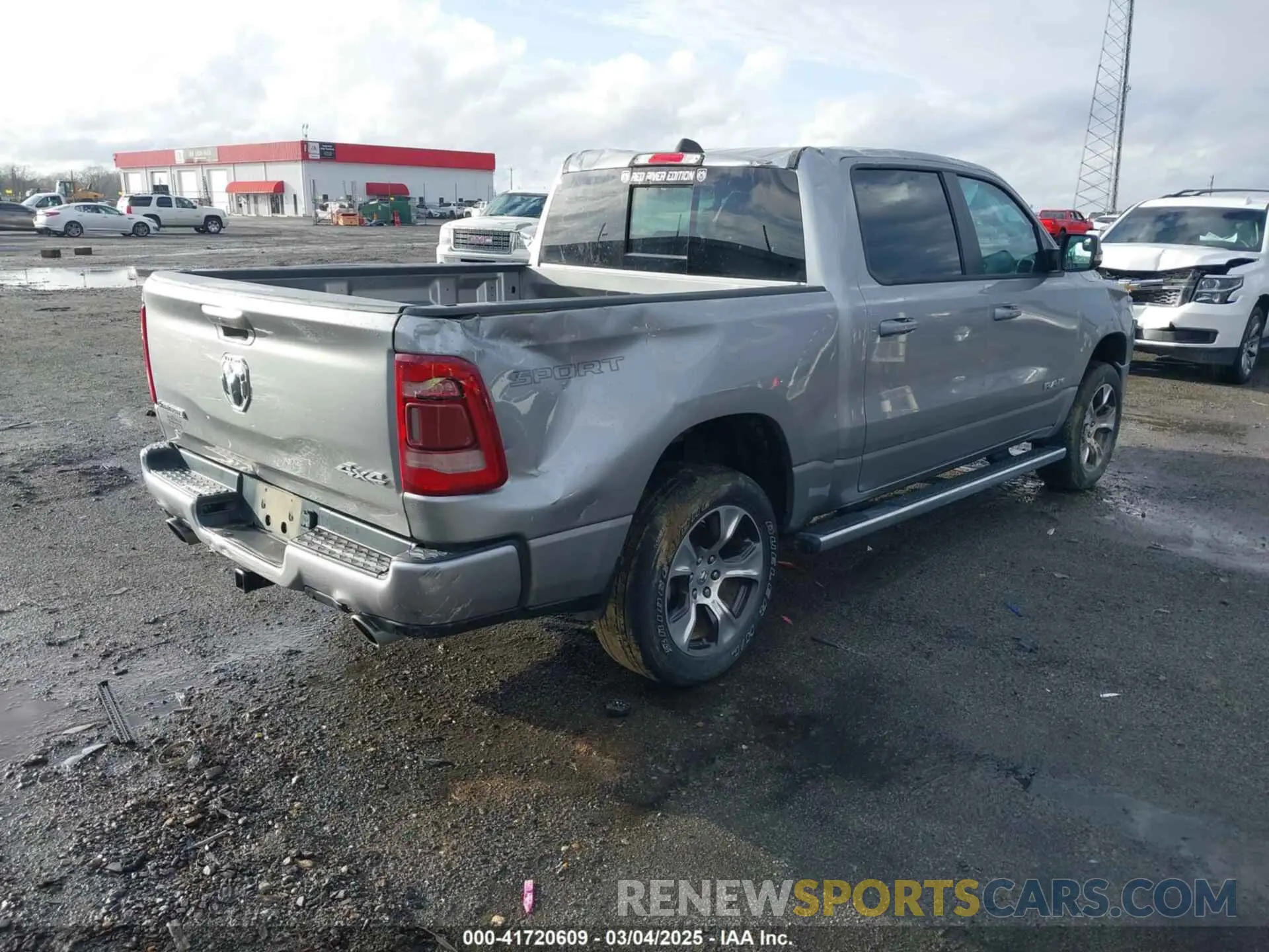 4 Photograph of a damaged car 1C6SRFJT6PN576366 RAM 1500 2023