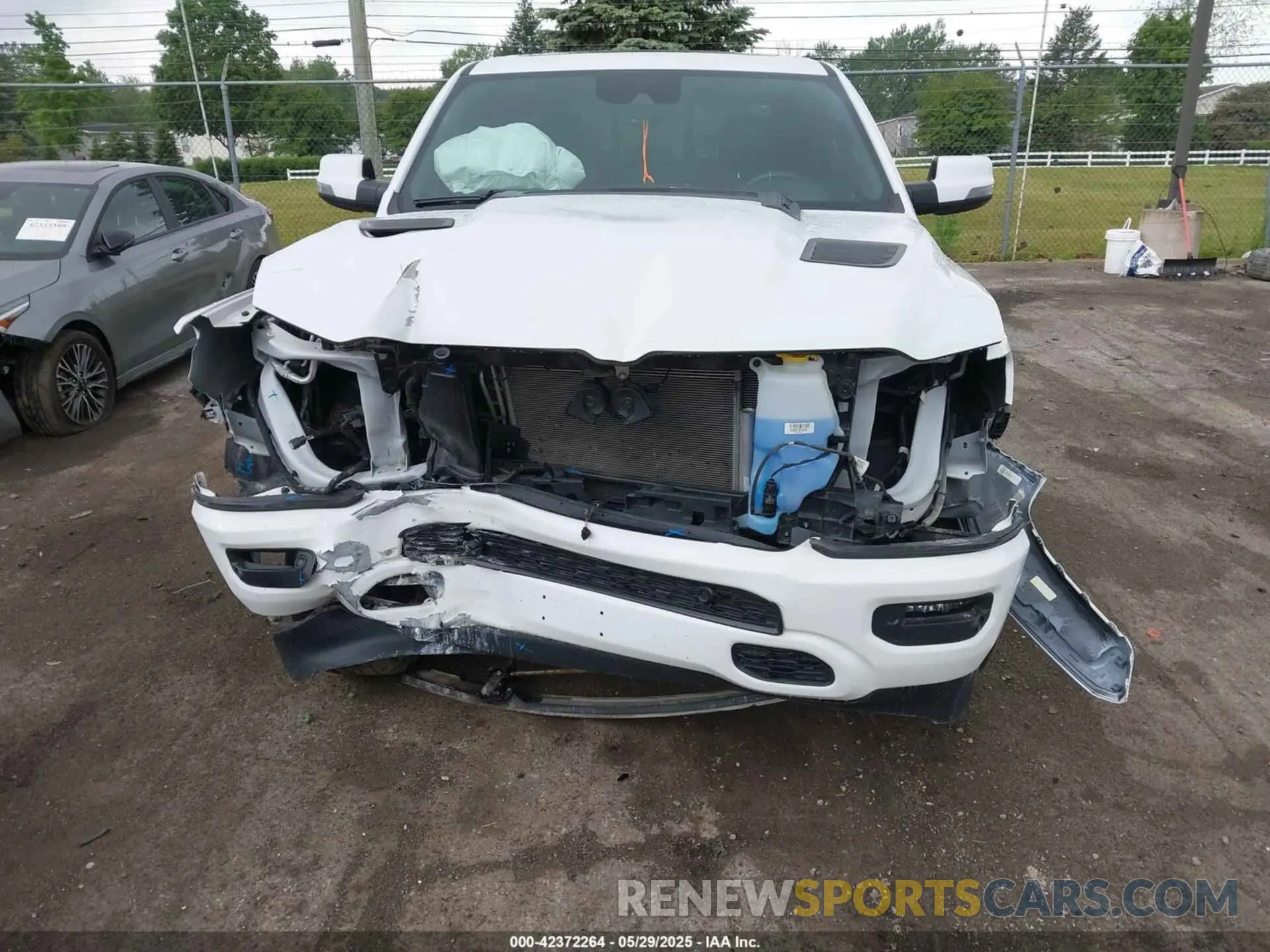12 Photograph of a damaged car 1C6SRFJT6PN621466 RAM 1500 2023