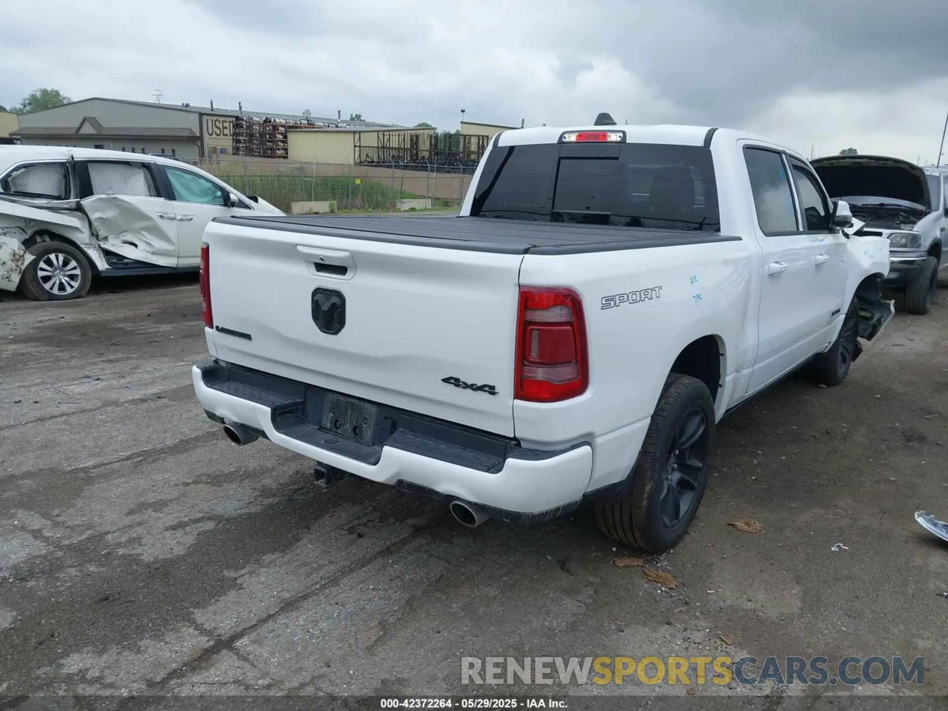 4 Photograph of a damaged car 1C6SRFJT6PN621466 RAM 1500 2023