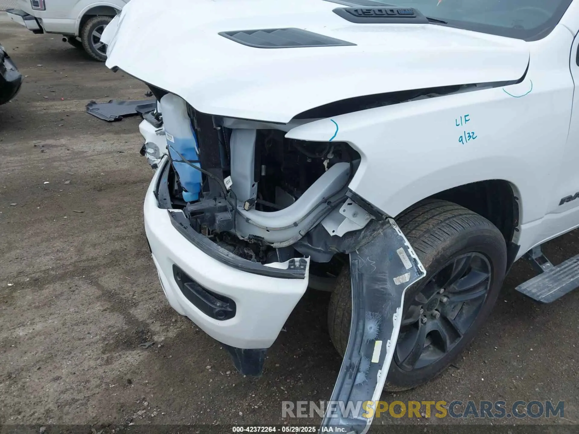 6 Photograph of a damaged car 1C6SRFJT6PN621466 RAM 1500 2023